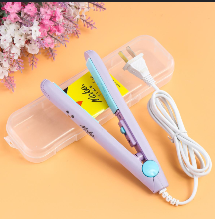 Mini portable hair straightener in purple with protective case